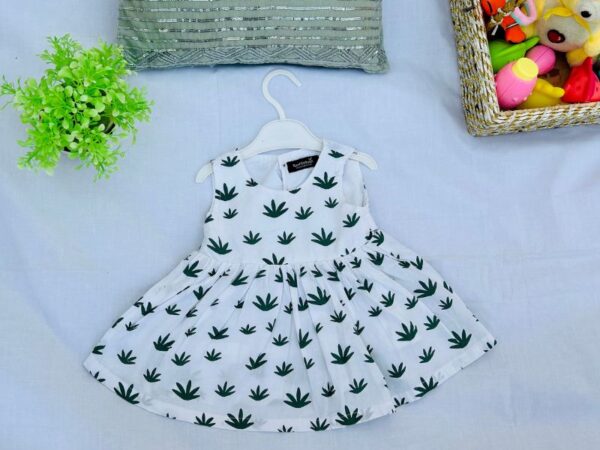 flat lay of a baby girl's sleeveless dress