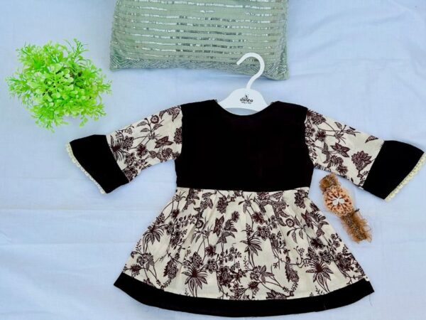 girl's long-sleeved dress with floral patterns